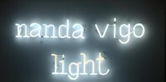 Text with illuminated letters bearing the words Nanda Vigo Light Project, title of the exhibition by Nanda Vigo held in 2019 in Milan, Palazzo Reale